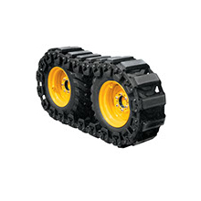 Equipment attachments Tracks: "Image of heavy machinery attachment: steel tracks used to enhance traction and stability on equipment such as excavators, wheel loaders, and bulldozers on rough and challenging terrain."